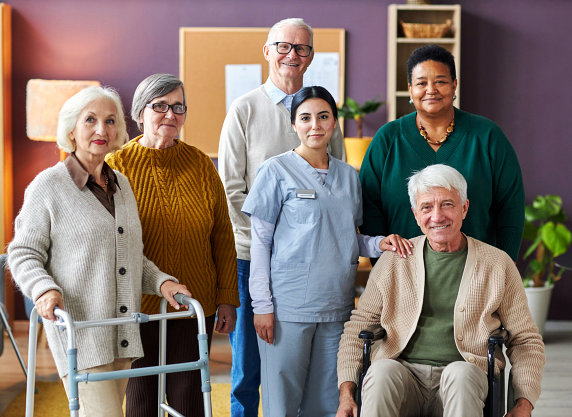 Group of elderly with nurse.