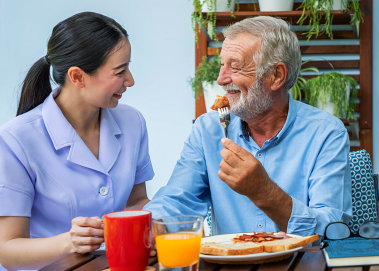 Caregiver prepared a meal for his patient.